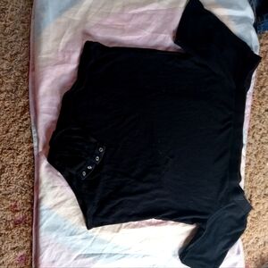 A all black off the shoulder large button bottom super stylish!